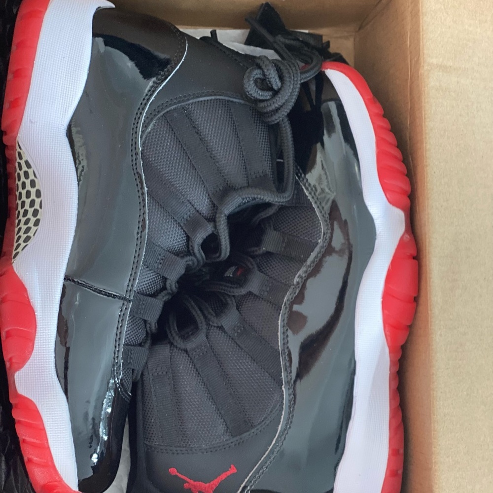 Jordan Retro 11 red & black Brand new , never worn. Comes with box
